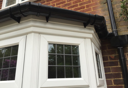 Bay window guttering installation and repair in Surrey by Surrey Roofers, providing efficient drainage solutions and protection.
